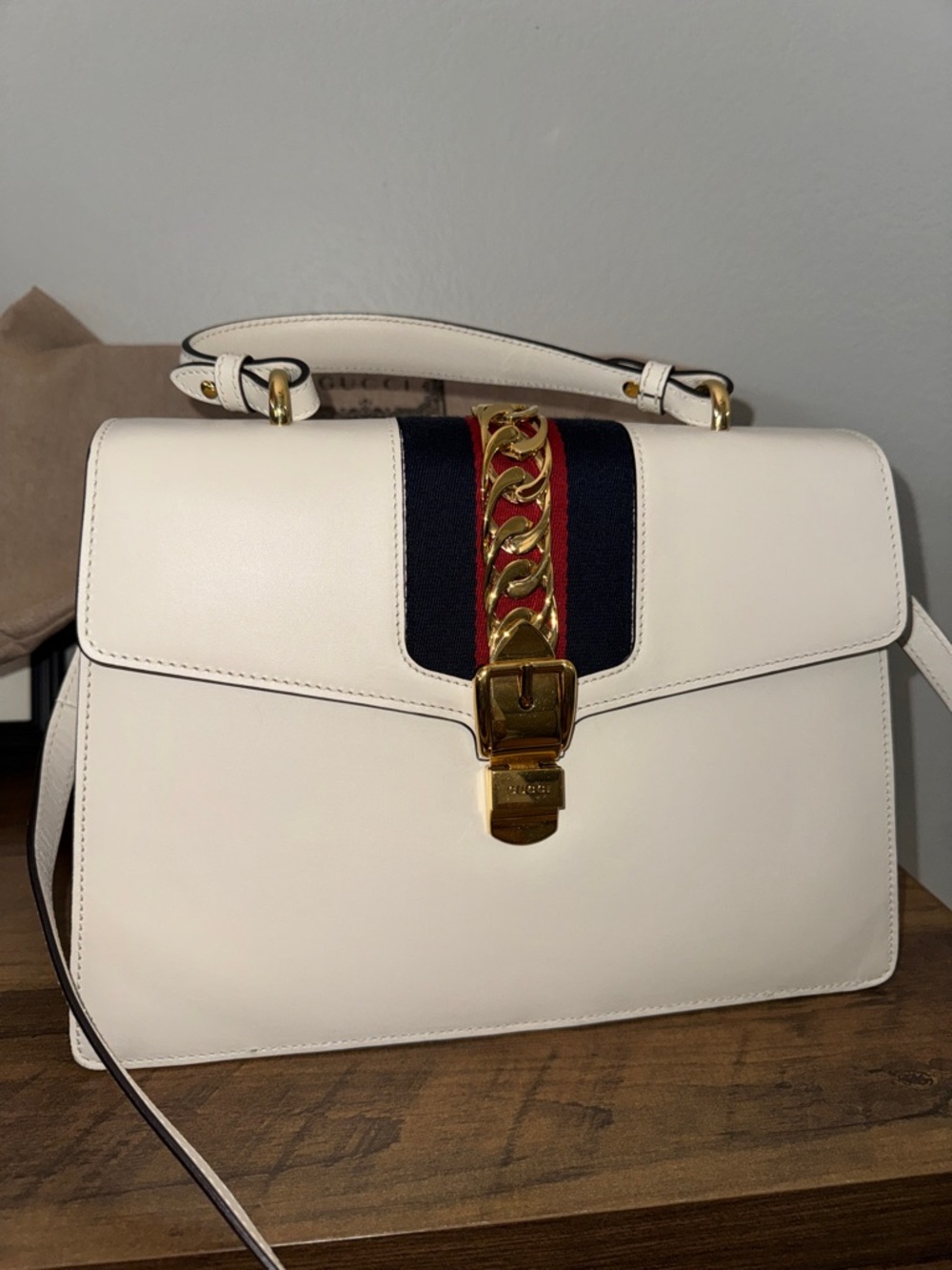 Gucci Top-Handle Bag with Gold Chain Accent
